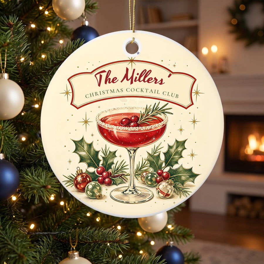 Personalized Christmas Cocktail Club ornament with a name on the banner, hanging on a lit Christmas tree