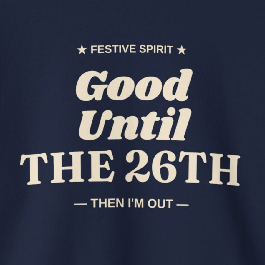 Close-up of the cream Festive Spirit Good Until the 26th Then I'm Out print on a Navy crewneck