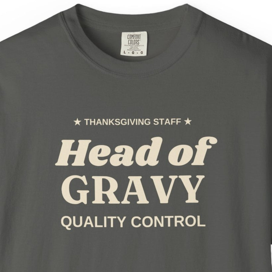 Close-up of the cream Head of Gravy Quality Control print on a Pepper Comfort Colors tee