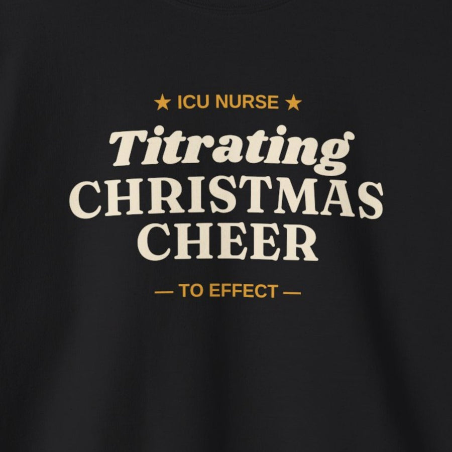 Close-up of the ICU Nurse Titrating Christmas Cheer print on a black crewneck