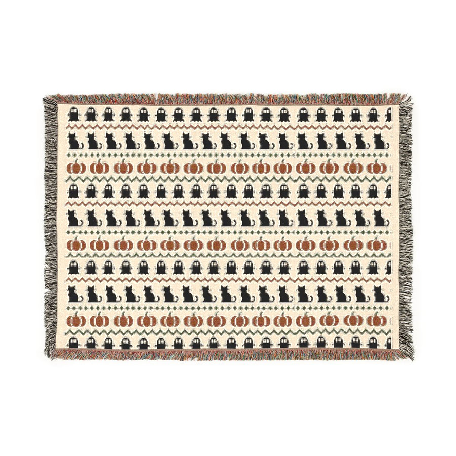 Haunted Heirloom Fair Isle woven blanket, front view of the ghost, black cat and pumpkin pattern with fringe