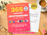 365 Large Print Cryptograms printable puzzle book cover on a wooden table with a solved puzzle page, instant download