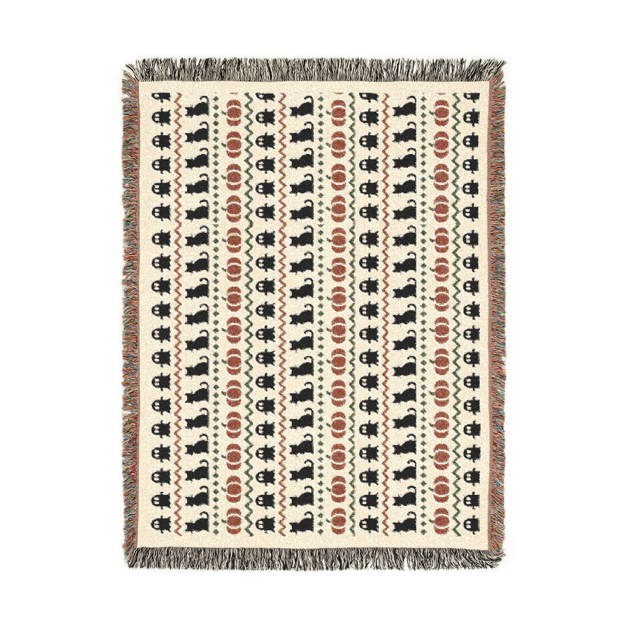 Fringed edge detail on the Fair Isle neutral Halloween woven blanket