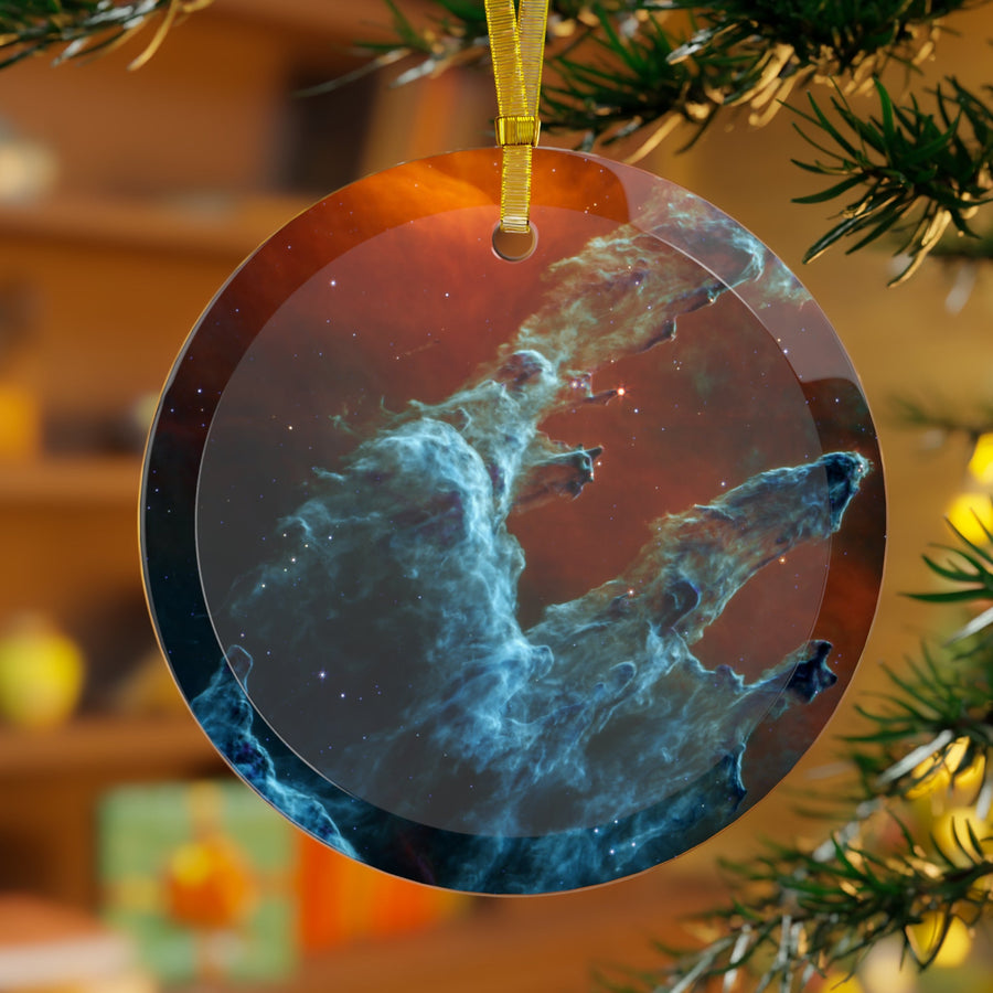James Webb Pillars of Creation glass Christmas ornament hanging on a Christmas tree