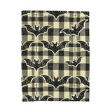 Bat plaid Halloween fleece blanket shown flat on white, full vintage bat and tartan repeat