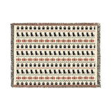 Neutral Halloween woven blanket with Fair Isle rows of ghosts, black cats and pumpkins in bone and rust