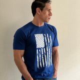 Man wearing the distressed USA flag tee in navy, three quarter view