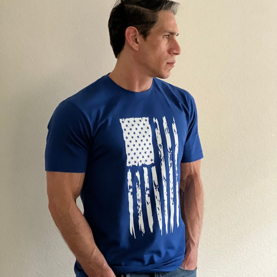 Man wearing the distressed USA flag tee in navy, three quarter view