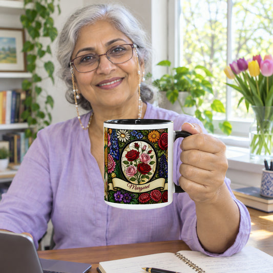 Woman at a sunny home office desk holding the stained glass birth flower name mug