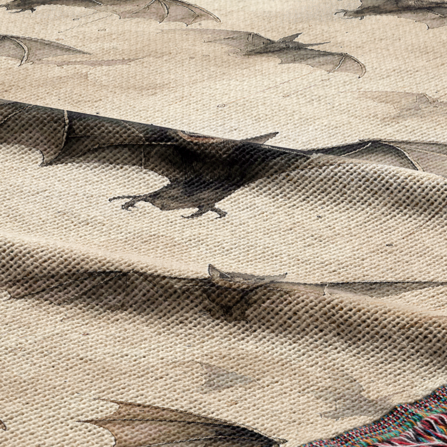 Person wrapped in the bat woven blanket, heavyweight cotton Halloween throw
