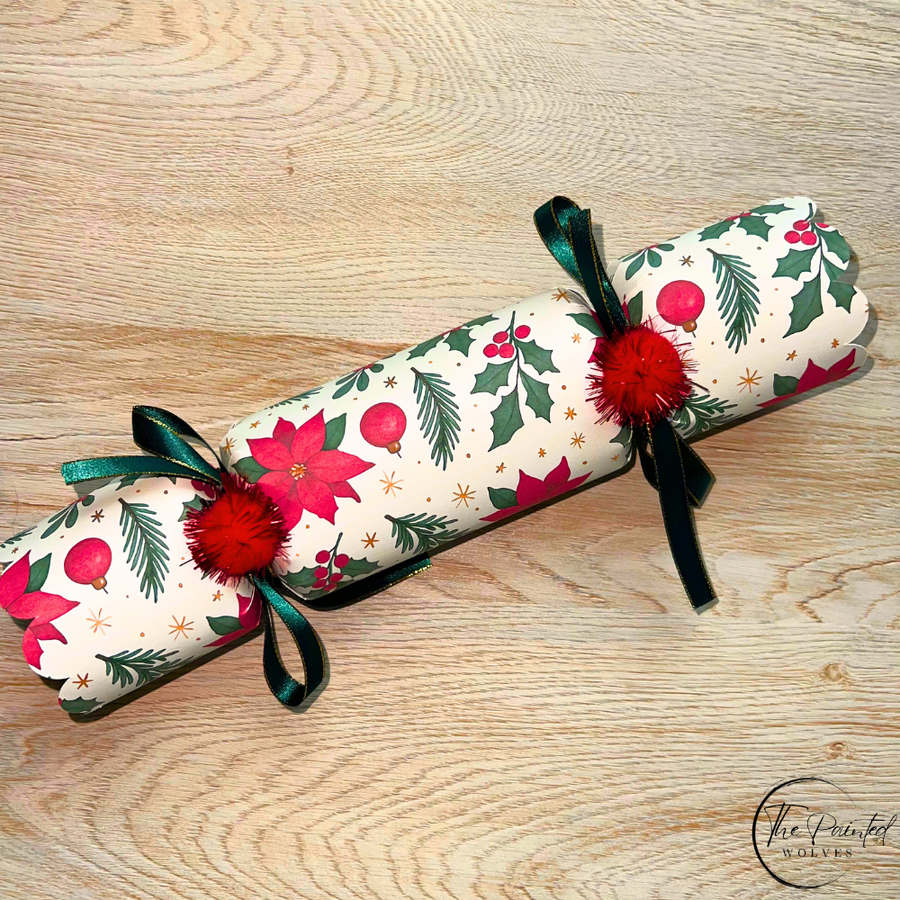 Close view of a red and green Christmas cracker showing the ribbon ties