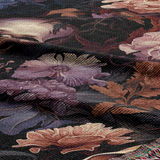Close up of the skull woven blanket weave and the floral detail around the skull