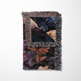 Skull woven wall hanging displayed as a gothic tapestry above a couch