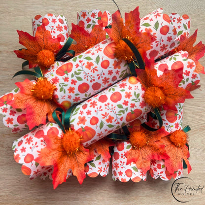 Decorated fall and thanksgiving themed crackers with snaps and decorated with leaves, ribbons and bells perfect thanksgiving dinner favor or dinner party gift 