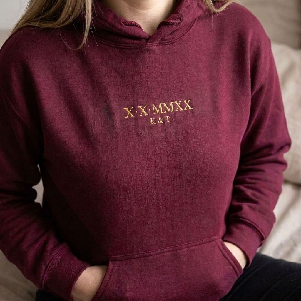 Maroon Roman numeral hoodie with X X MMXX and K & T embroidered in old gold thread