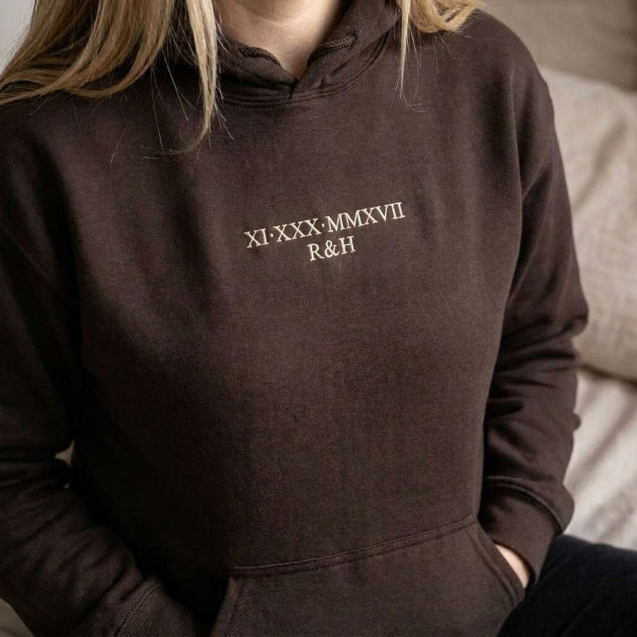 Dark chocolate Roman numeral hoodie with XI XXX MMXVII and R & H embroidered in cream thread