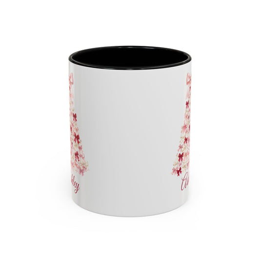 Front view of the coquette bow Christmas tree mug showing the pink bow tree print