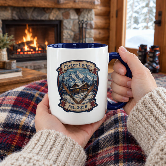 Hands holding the personalized ski lodge family name mug by a cabin fireplace