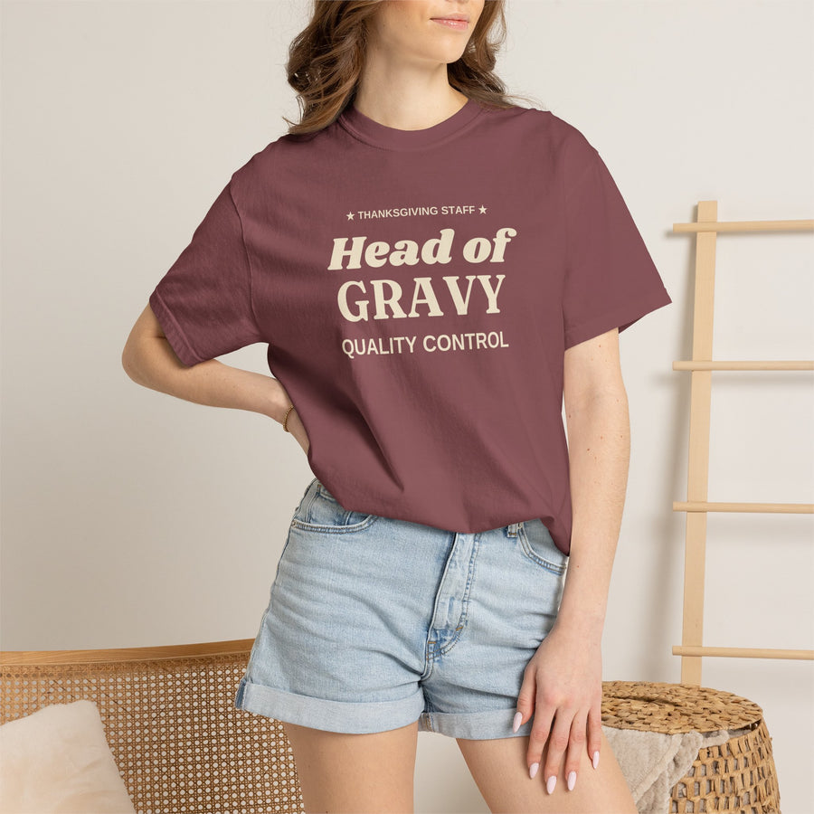 Woman wearing the Brick Head of Gravy Quality Control Thanksgiving tee with denim shorts