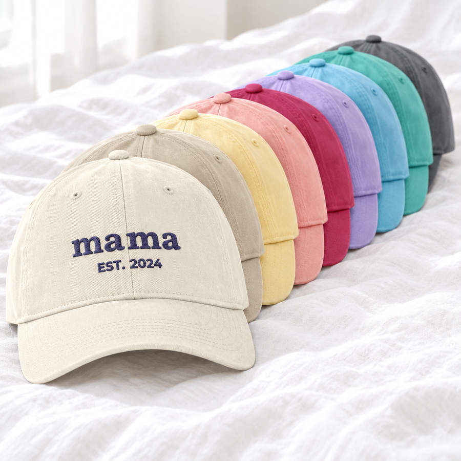 Stack of washed dad hats in nine colours