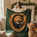 Woman holding up a custom Royal-style pet portrait blanket of her goldendoodle Sir Waffles while the dog sits beside her