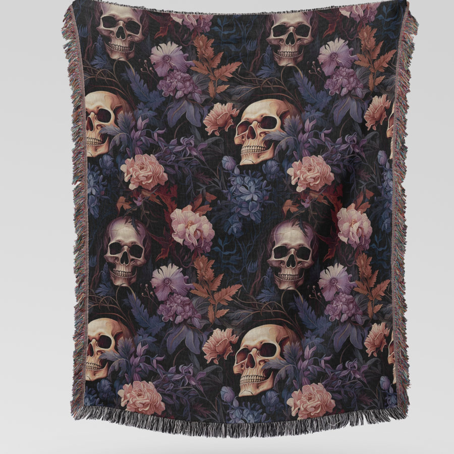 Video of the skull woven blanket being unfolded to show the gothic floral design