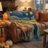 Short video of the Van Gogh Halloween woven blanket on a leather sofa
