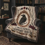 Short video of the Emotional Support Raven woven blanket in a cozy reading nook