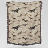Video of the bat woven Halloween blanket being unfolded and draped