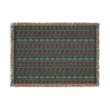 Reverse side of the Haunted Heirloom woven blanket in muted tones