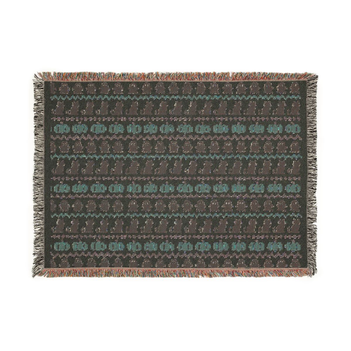 Reverse side of the Haunted Heirloom woven blanket in muted tones