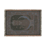 Reverse side of the Overlord woven blanket in muted tones