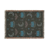 Back of the Subtle Spooky neutral Halloween woven blanket showing the reverse side of the weave