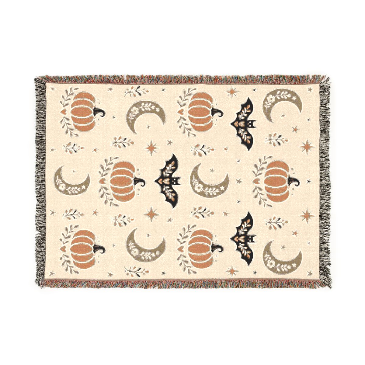 Subtle Spooky neutral Halloween woven blanket laid flat, cream weave with orange pumpkins, tan moons and black bats, multicolor fringe