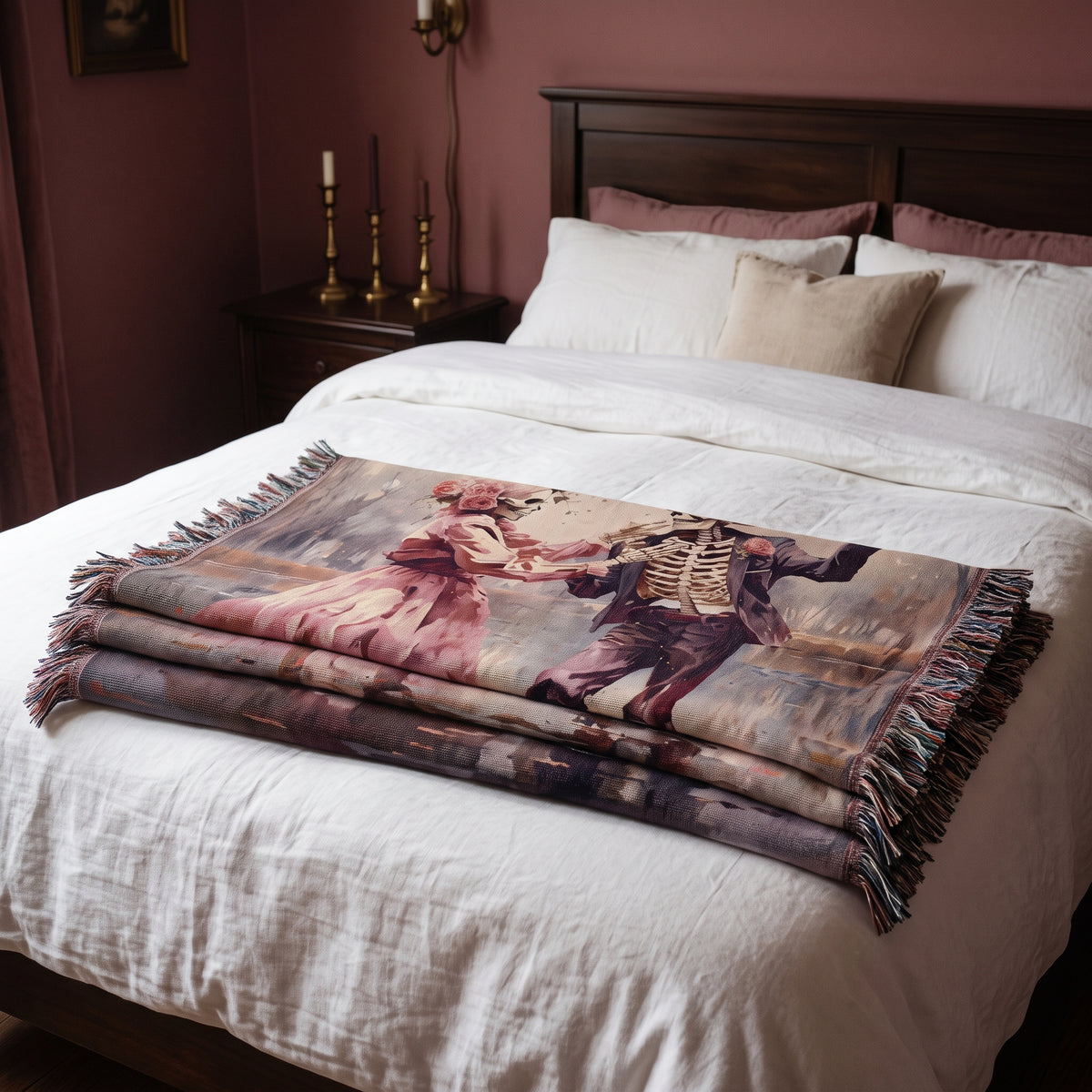 Till Death Do Us Part pink skeleton couple woven blanket folded across the foot of a queen bed